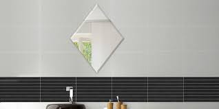 Narrow frame detailed in a repeating stylized acanthus leaf design of carved wood and gesso, with a gilt finish. Diamond Wall Mirrors Bathroom Frameless Diamond Wall Mirrors Online