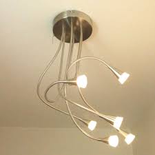 I attached the pull chain to the ceiling fan, mated the barrel plug to its jack, and hung the circuit from the lamp's diffuser bowl. Led Ceiling Light With Flexible Arms Pull Chain Light Fixture Antique Light Fixtures Light Fixtures