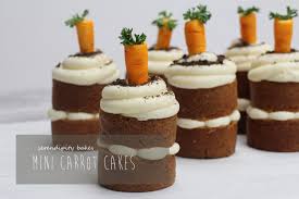 A mini carrot cake topped with a rich cream cheese frosting. Mini Carrot Cakes Serendipity Bakes