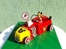Help them develop fine motor skills as they play at filling up the car and tuning it up for the race. Mickey Mouse Race Car Cake Cake By Lacrimioara Lily Cakesdecor