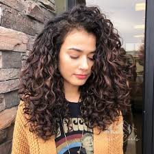 Uniform layers in the back and sides maintain an all over balance and full layers through the top create height and body. Reno Sparks Naturally Curly On Instagram We Created A Ton More Shape And Painted Some Cu Curly Hair Styles Naturally Curly Hair Styles Curly Hair Inspiration