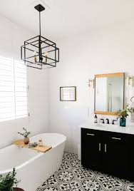 Thinking of remodeling your bathroom? Black And White Bathroom Remodel Bathroom Design Bathroom Interior White Bathroom