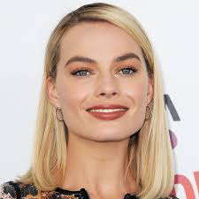 Margot Robbie Embraces Barbiecore Style At CinemaCon