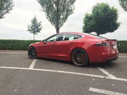 tesla model s with hre p104 in satin bronze 2 tesla model s tesla tesla motors