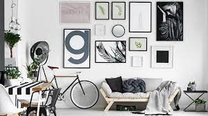 Framing a shelf with several wall arts is another way to correctly implement wall art ideas. Smart Wall Decor Ideas To Liven Your Room Build Magazine