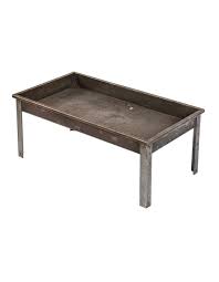 The straight legs, thin poles underneath the table, and riveted metal accents on the sides all add to the rustic design. Vintage Industrial Tables Furniture Products
