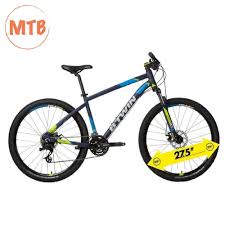 A photo of the btwin st520, mountain bike, 27.5 in use. Btwin Rockrider 520 Mtb Cycle Decathlonb2b