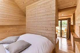 modern home with bedroom bed medium hardwood floor and recessed lighting photo 2 of cote d azur cave house house cave house modern bedroom