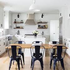 Maybe you would like to learn more about one of these? Navy Blue Tolix Chairs At Wood And Brass Dining Table Kitchen And Bath Design Metal Dining Chairs Brass Dining Table