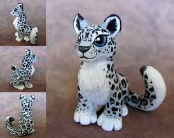 Snow Leopard By Dragonsandbeasties On Deviantart Cute Clay Polymer Clay Animals Cute Polymer Clay