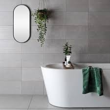 The diagonal tiles make a rear accent wall in the shower enclosure. Top 10 Bathroom Wall Tiles Stylish Designs Walls And Floors Walls And Floors