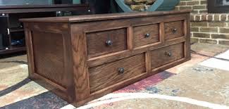 The next step after finishing the tool work is the staining of the coffee table making it look a complete and accomplish piece to rock your living room spaces. Build A Coffee Table With Blanket Storage