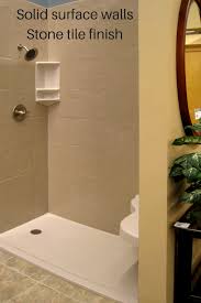 Showers with tiled walls and floor can look minimalist or luxurious depending on the choice of the tile. 4 Design Options In Grout Free Diy Shower Tub Wall Panels Bathroom Shower Panels Shower Wall Panels Corian Shower Walls