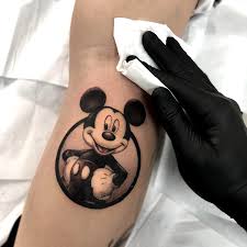 Colorful outline mickey mouse tattoo on leg. Mikey Mouse Tattoo Idea Realism Micro Tatuaje Girl Mickey Tattoo Mickey Mouse Tattoos Tattoos