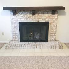 She and her team carefully applied gray paint. Paint Your Brick Fireplace In 2 Easy Steps Birkley Lane Interiors