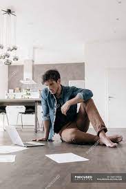 Find & download the most popular man sit floor photos on freepik free for commercial use high quality images over 6 million stock photos. Young Man Sitting On The Floor In A Loft And Using Laptop Online Planning Stock Photo 258109930