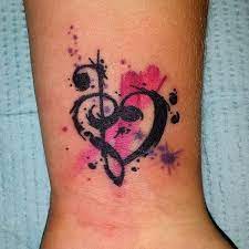 In this way, music lets your heart and soul experience your inner feelings in a better way. Musical Note Heart Watercolor Tattoo On Wrist
