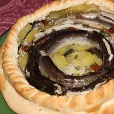 Sto ovviamente parlando di sa panada, una crosta di pasta croccante che racchiude tutti i sapori della terra sarda. La Ricetta Della Panada Con Le Anguille Corbula Cose Luoghi Tipicita E Ispirazioni