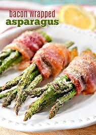 Delicious Bacon Wrapped Asparagus Is An Easy Side Dish That Can Be Whipped Up In About 20 Bacon Wrapped Asparagus Bacon Wrapped Bacon Wrapped Asparagus Recipes