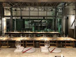 See more ideas about dining room decor, dining room design, decor. Sunda Dining Looking Out To The Dining Room From The Kitchen Two Large Communal Tables And Six Seats At The Bar Our Upstairs Mezzanine Level Is Now Open Where There Are