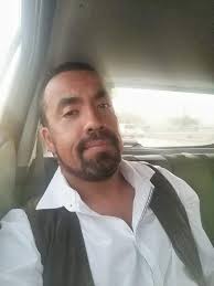 Undertaker disfrutando el fin de semana de la independencia de Estados  Unidos viendo como su familia practica lucha libre en la playa mientras él  funge como árbitro especial.