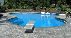 Modular poolside climbing walls are a safe and fun alternative to diving boards. How To Safely Design A Diving Board Pool