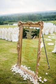 picture of rustic mirror wedding seating chart in an antique