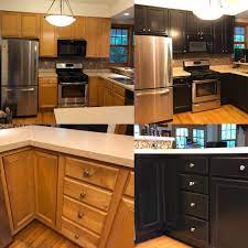 Make your kitchen look rich and exotic by finishing your cabinets in black onyx. Kitchen Cabinet Refinishing Maple To Black Satin Craine Painting Llc