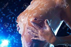 Young Woman Wet Breast With Soap. Stock Photo, Picture and Royalty Free  Image. Image 24293217.