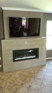 If you're interested in their brand, you're in good luck. Napoleon Lhd45 Linear Fireplace With Crystaline Ember Bed This Look Was Finished With A Custom Wall System Crafted Linear Fireplace Fireplace Fireplace Stores
