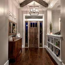 Front entry doors of this style typically consist of wood materials and use rectangular windows and panels to establish depth. 75 Beautiful Craftsman Foyer Pictures Ideas July 2021 Houzz
