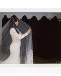 Check spelling or type a new query. A Never Before Seen Photo Of Kim Kardashian S Other Wedding Dress Martha Stewart