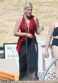 Tori spelling's husband dean mcdermott desperately tries to win her back, drops thirsty comment on 'hot' selfie despite no wedding ring amid marriage . Tori Spelling Wears A Crimson Swimsuit To The Pool With Her Husband Dean Mcdermott For Mother S Day Geeky Craze
