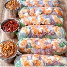 Zang toi's supremely crispy spring rolls are filled with a mix of marinated shrimp, ground pork and a handful of colorful julienned vegetables, like carrot on a work surface, brush the edge of 1 spring roll wrapper with a little of the beaten eggs. Vietnamese Shrimp And Pork Summerrolls 30aeats