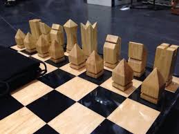 Chess table a chess table can be a popular addition to a den or living room, especially since it offers a pleasant alternative to the seemingly endless nonsense coming from the television set. Retro Geometric Wooden Chess Set Chess Board Wooden Chess Pieces Wooden Chess Set
