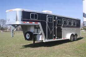 This is a heavy duty built all aluminum trailer on quality par with 4star. 2000 Featherlite Black 3 Horse With 8 Lq