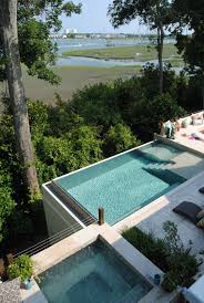 Custom Stainless Steel Infinity Edge Pool With A Built In Sundeck And Lounger Overlooking The Intracoastal Waterway Pool Houses Dream Pools Residential Pool