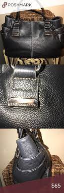 Do all of these bags have a tignanello logo lining? Leather Tignanello Black Leather Handbags Leather Tignanello