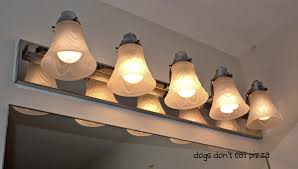 How To Update Bathroom Lighting It S As Easy As Changing A Lightbulb Dogs Don T Eat Pizza