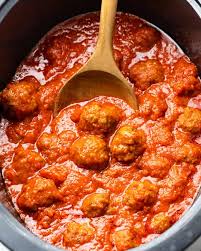 In a large bowl, mix all ingredients together and 1/4 cup of the barbecue sauce. Slow Cooker Meatballs The Cozy Cook