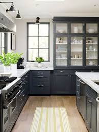 In this gorgeous kitchen, honed absolute black granite countertops balance white shaker cabinets while white subway tile gives sparkle and glow to the space. Black And White Kitchens Freshsdg