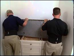 Neptune bordeaux granite bathroom vanity top with square vessel sink by kraus from how to order a new granite vanity top. Installing A Granite Vanity Top Youtube