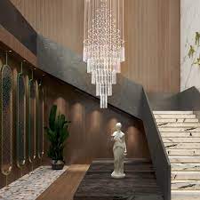 The brushed bronze hardware gives it an antique feel that is traditional yet contemporary. Floating Castle Round Raindrop Crystal Chandelier For Foyer Sofary