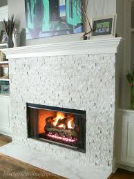 White stone fireplace living room with two story stone fireplace surrounded by custom cabinets white stone fireplace white ashwell white marble fireplace with ontario electric fire, 43 inch. Home Tour Continues Stacked Stone Fireplaces Stone Tile Fireplace Fireplace Remodel