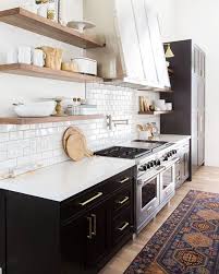 Black And White Kitchen Mat L O O M K I L N On Instagram Black White Brass Kitchens With A Fabulous Vintage Rug Totally Make Thi Kitchen Inspirations Kitchen Interior Kitchen Design