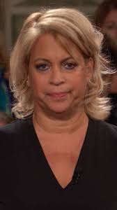 Carlos claims his neighbor Vera's wall fell down because it's old. He  denies hitting it with his car.