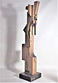 The artistic work of this contemporary wood artist consists of sculptural forms and wood art. Signed Modern Abstract Constructivist Styled Wooden Sculpture For Sale At 1stdibs