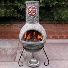 A fire pit wins hands down on this standoff. Clay Chiminea Fire Pit Backyard Diy Fire Pit Backyard Backyard Garden Layout