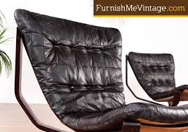 Leather sling chairs have long been popular, with older editions for sale from the 19th century and newer versions made as recently as the 21st century. Mid Century Modern Scandinavian Leather Sling Chair