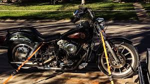 It has polished cases, most 82's were painted black it has a gold commemorative eagle on the front fender. 1982 Harley Davidson Fxb Sturgis Dennis Kirk Garage Build